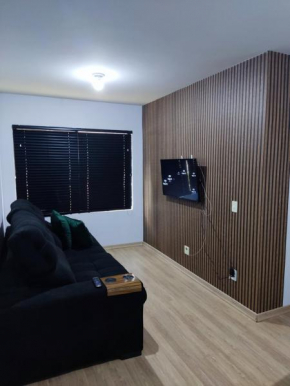 Apartamento mobiliado com ar condicionado em um quarto